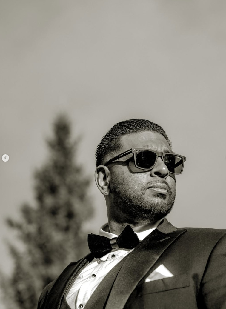 Black and white groom portrait